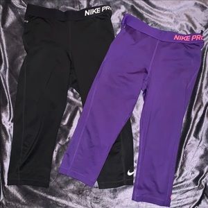 Two Nike Pro Dri-Fit Cropped Leggings